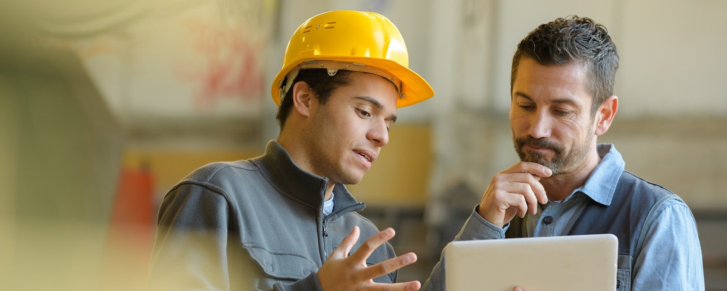 Boss,And,Worker,Checking,Results,On,The,Tablet