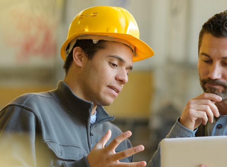 Boss,And,Worker,Checking,Results,On,The,Tablet
